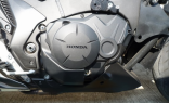 Оригинальная защитная накладка крышки сцепления мотоцикла Honda VFR1200F (64710-MGE-700)
