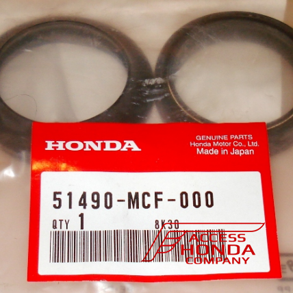 Оригинальный комплект сальник+пыльник для мотоцикла Honda 51490MCF000 (51490-MCF-000)